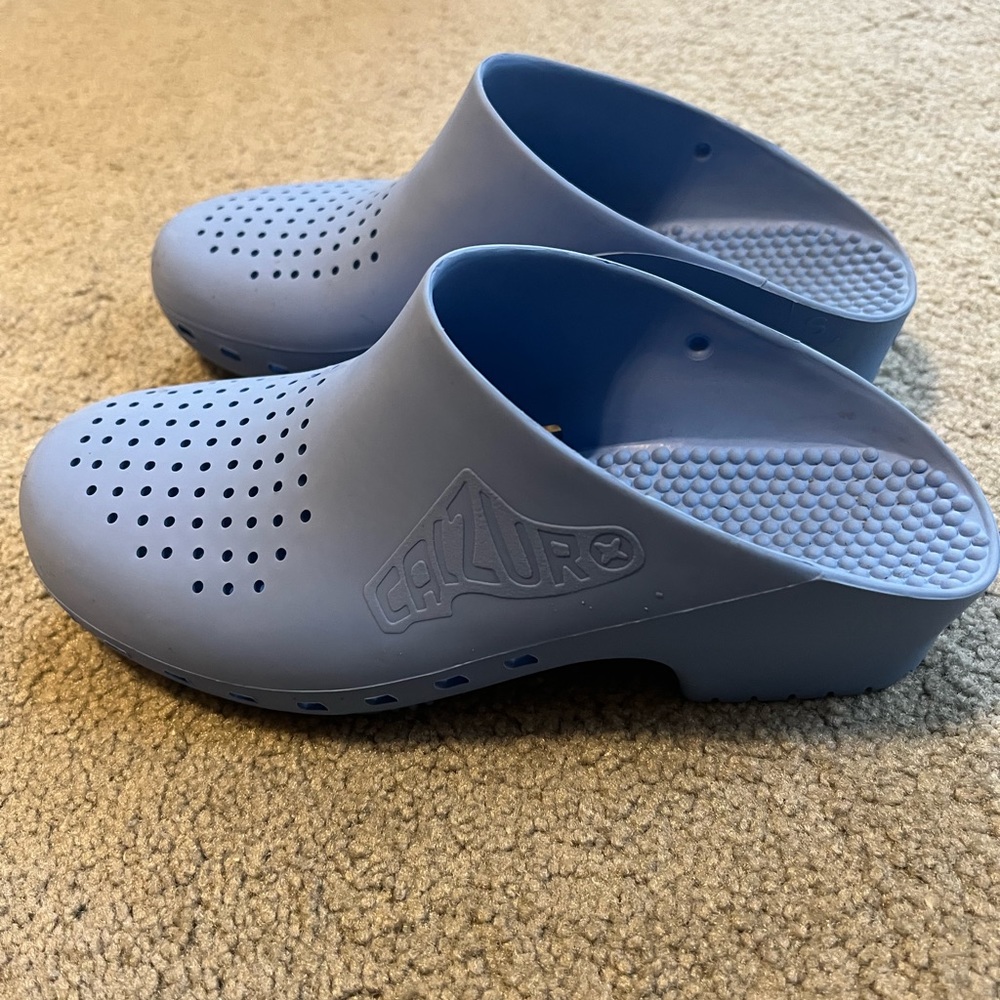 Gently used light blue Calzuro classic with holes